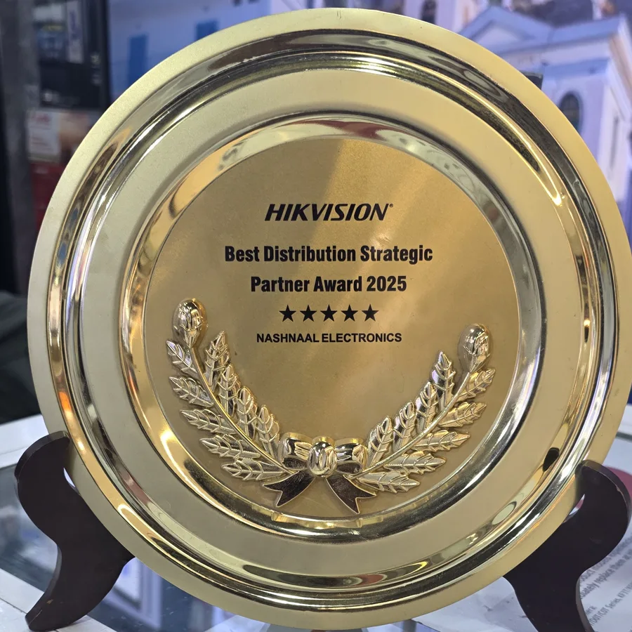 Hikvision Best Distribution Strategic Partner Award 2025 gold plaque, five stars, engraved Nashnaal Electronics, on display in the NE showroom