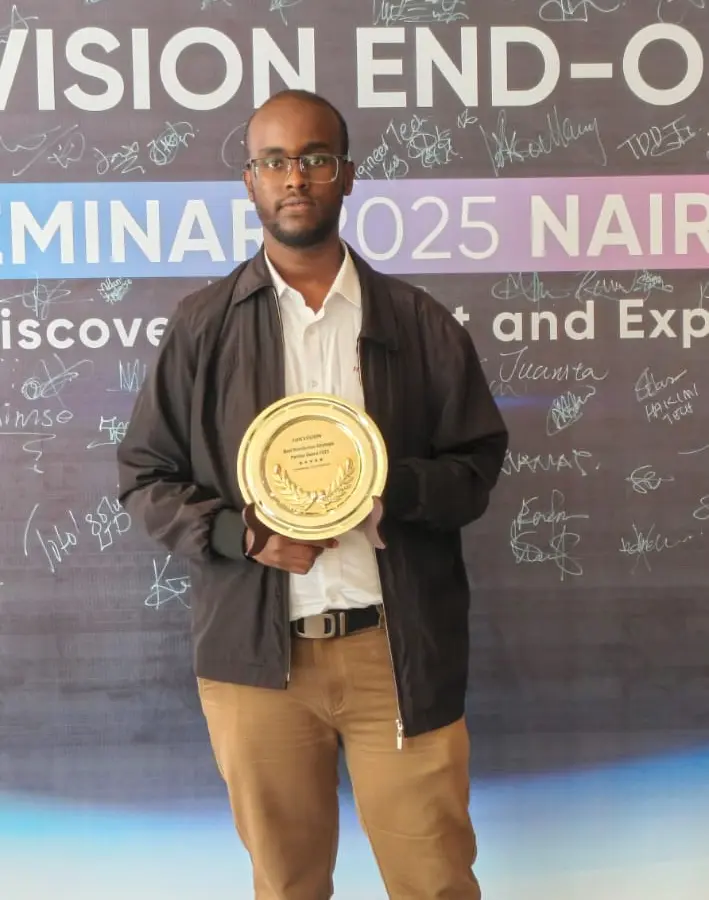 NE receiving the Hikvision Best Distribution Strategic Partner Award 2025 at the Hikvision End-of-Year Seminar in Nairobi