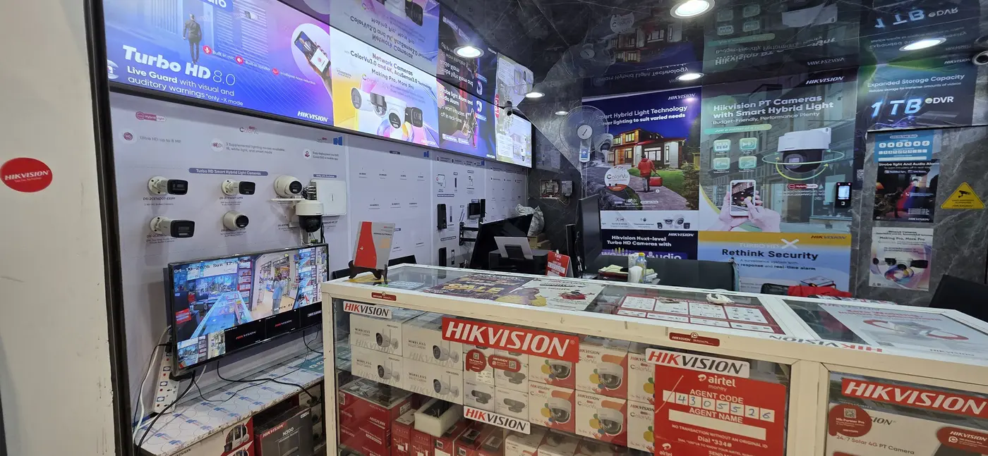 Live Hikvision camera wall and display counter inside the NE showroom