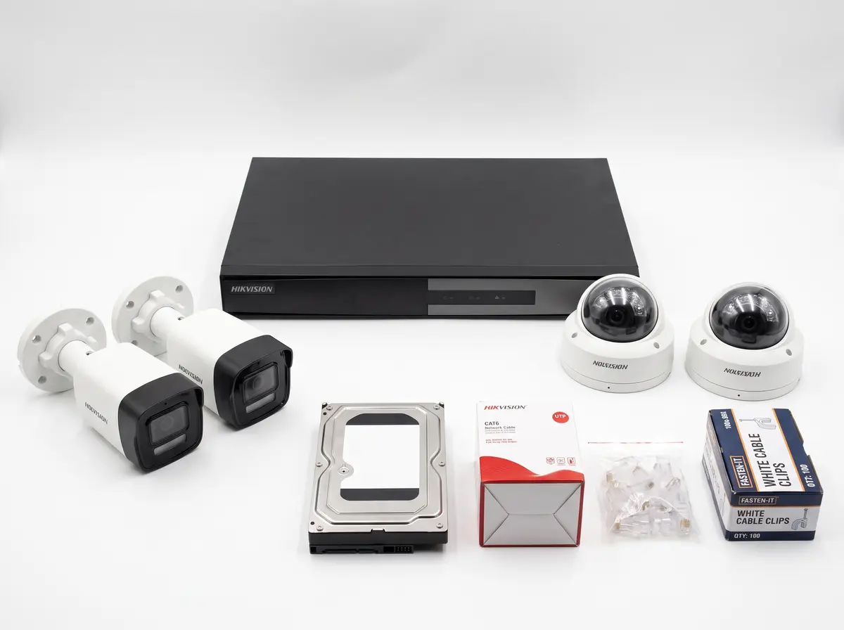 4MP Smart Hybrid Light camera kit: bullet and dome IP cameras, PoE NVR, hard disk, CAT6 cable, RJ45 plugs and clips